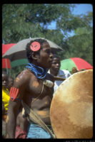Shagihilu Ng'wana Shitapondya, a member of the Kadumu dance group of Washa Ng'wana Shagembe from Ng'wagimagi performing at the compound of the healer Nyumbani Shilinde (Mungu wa Pili), July 10, 1996, Ntulya village